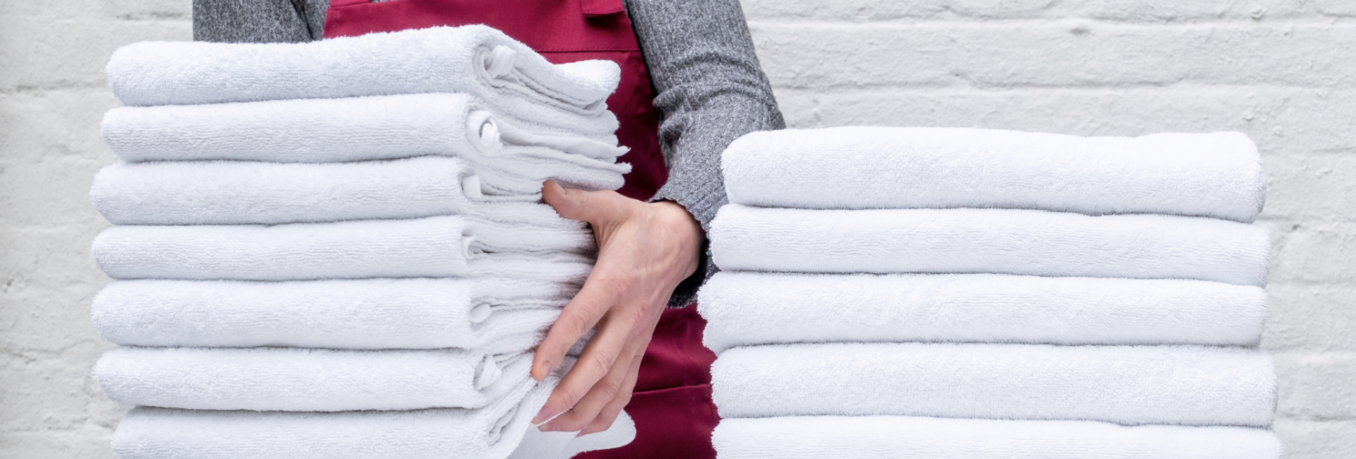 Towel Laundry Towels Being Stacked 1920X650